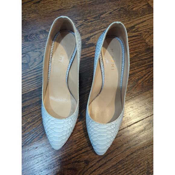 M. Gemi Lustro Snakeskin Pumps